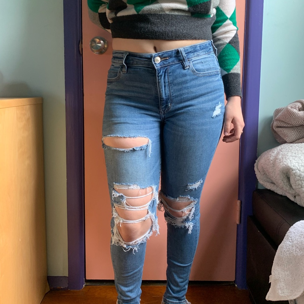 AE next level stretch skinny ripped jeans